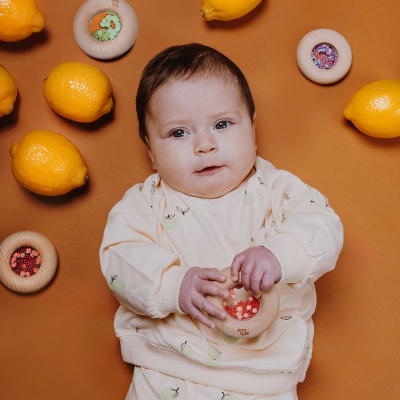 Hochet sensoriel Sensory Donut tomates- PETIT BOUM